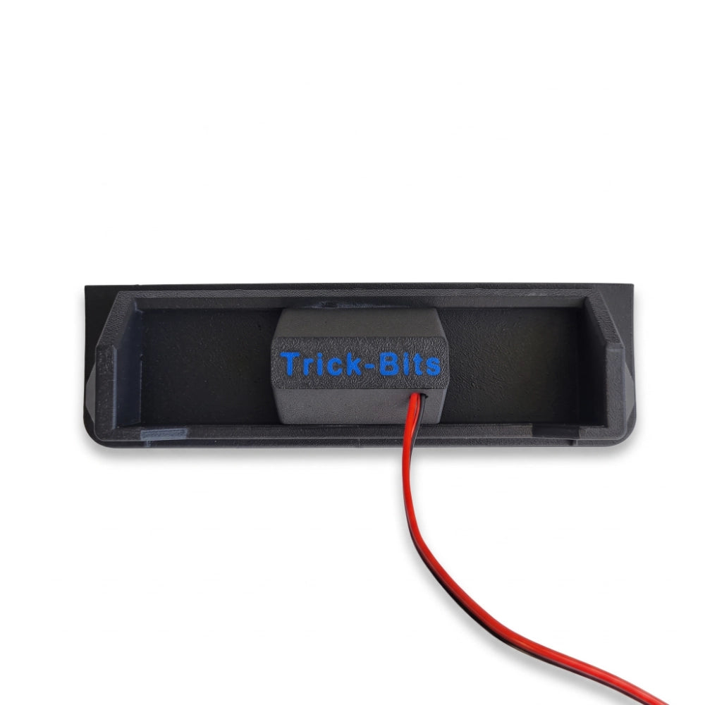 Close-up rear view of a BMW E39 dual port 65 watt rear charging station