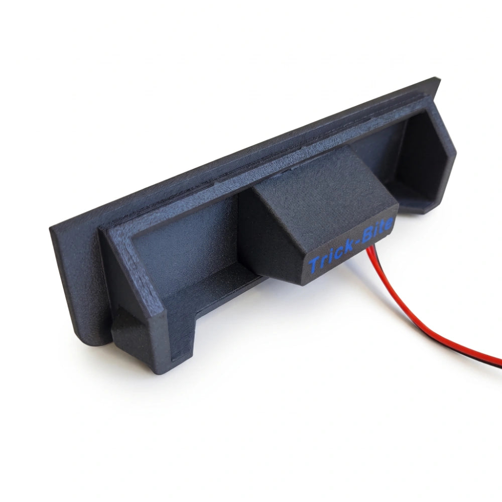 Close-up rear of a BMW E39 dual port 65 watt rear charging station